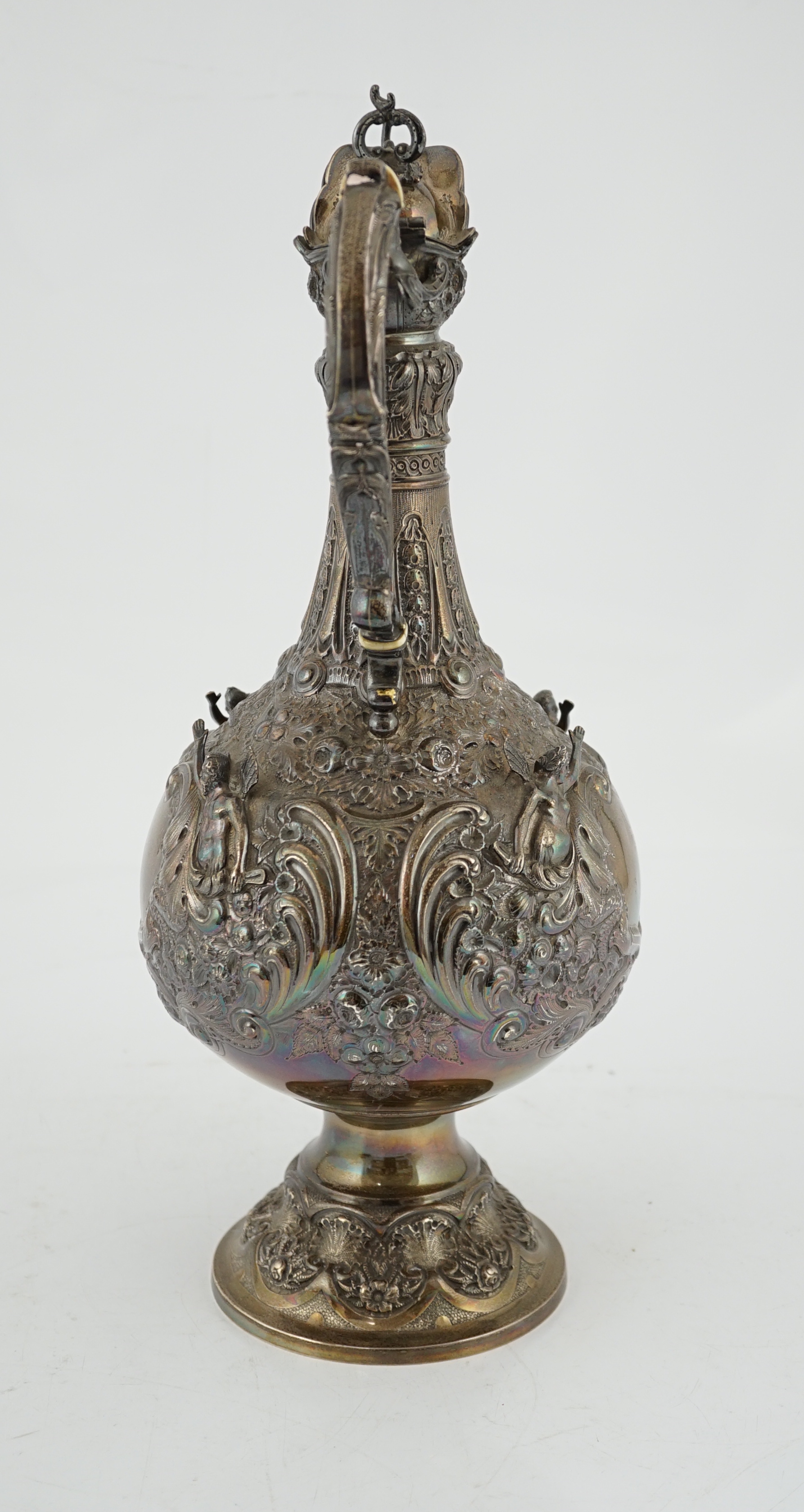 An ornate Victorian silver hot water jug, by Elkington & Co, CITES Submission reference UF9517NZ